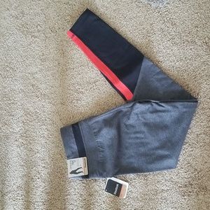 Reebok gray leggings with color pop Size medium NWT